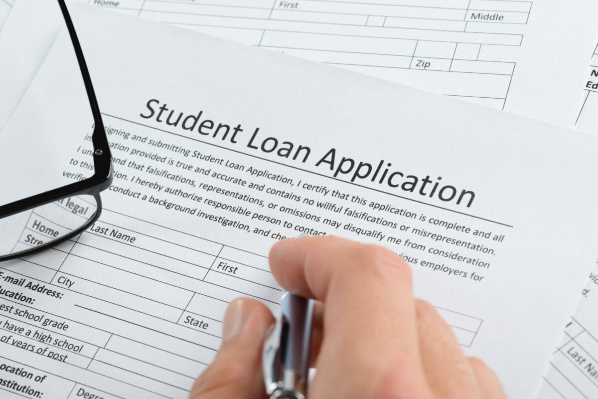 Hand With Pen Over Application